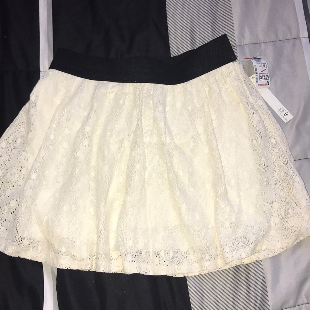 cream colored laced flowy skirt